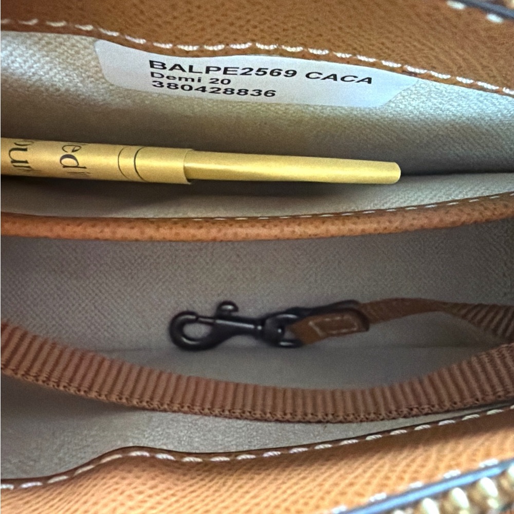 Dooney & Bourke Alpine Demi 20 Caramel Pebble Leather with Duck Logo, NWT - Picture 8 of 8